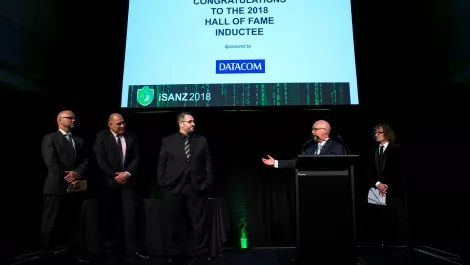 Nzitf chair barry brailey accepts hall of fame award on behalf of nzitf members